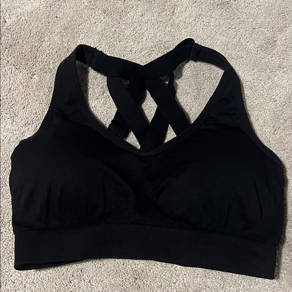 Size medium fittin black padded racerback sports bra